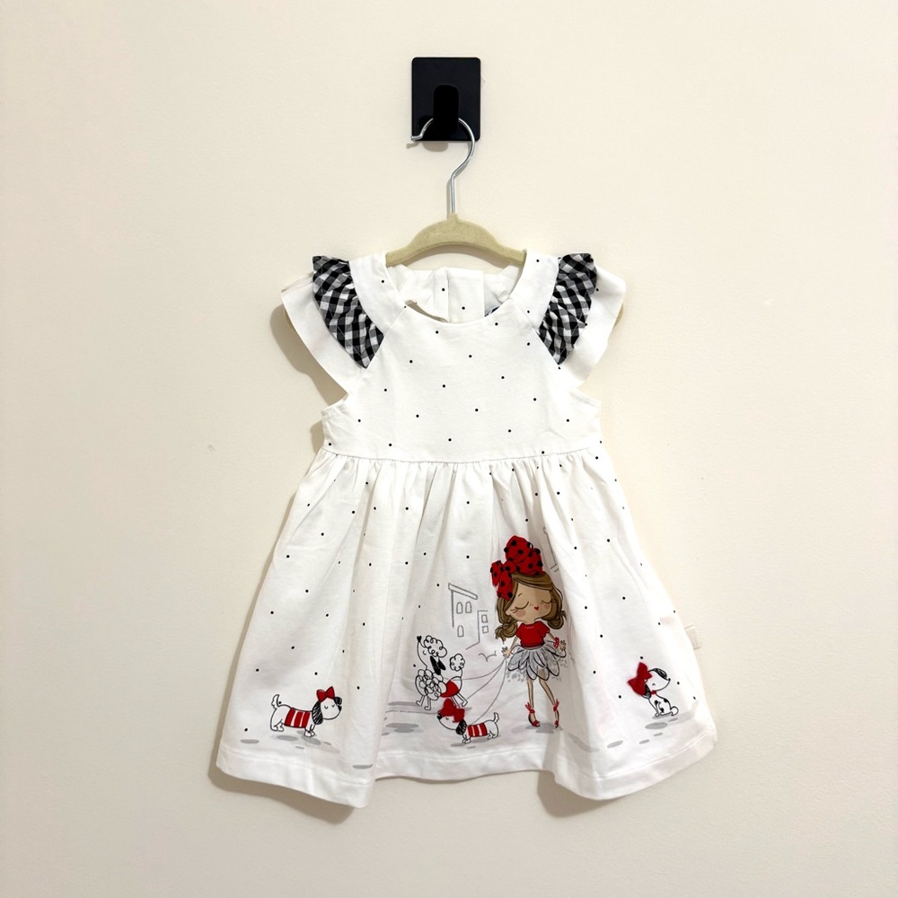 White Dress with Red and Black Accents